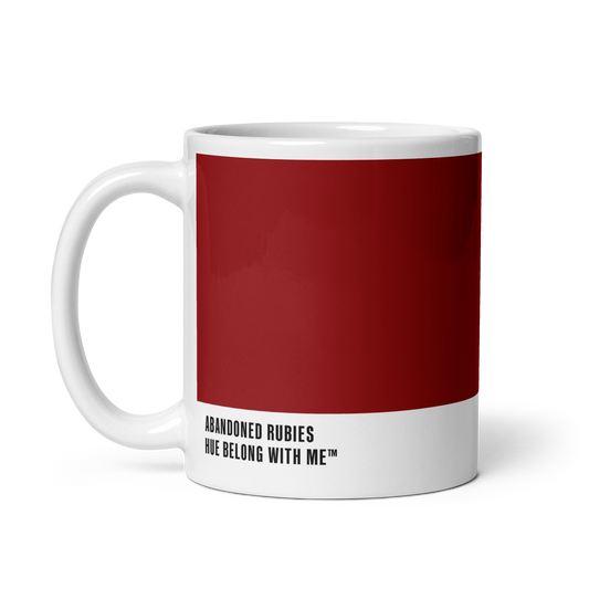 Deep scarlet ceramic mug, handle left, showing Abandoned Rubies label — Abandoned Rubies by Hue Belong With Me