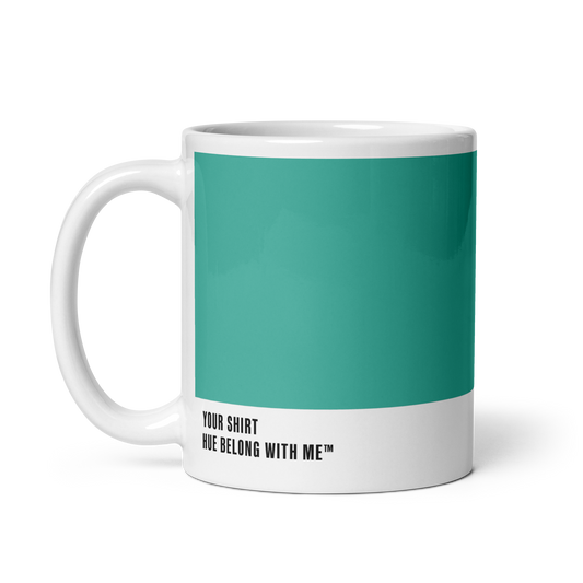 Crisp high-contrast teal ceramic mug, handle left, showing Your Shirt label — Your Shirt by Hue Belong With Me