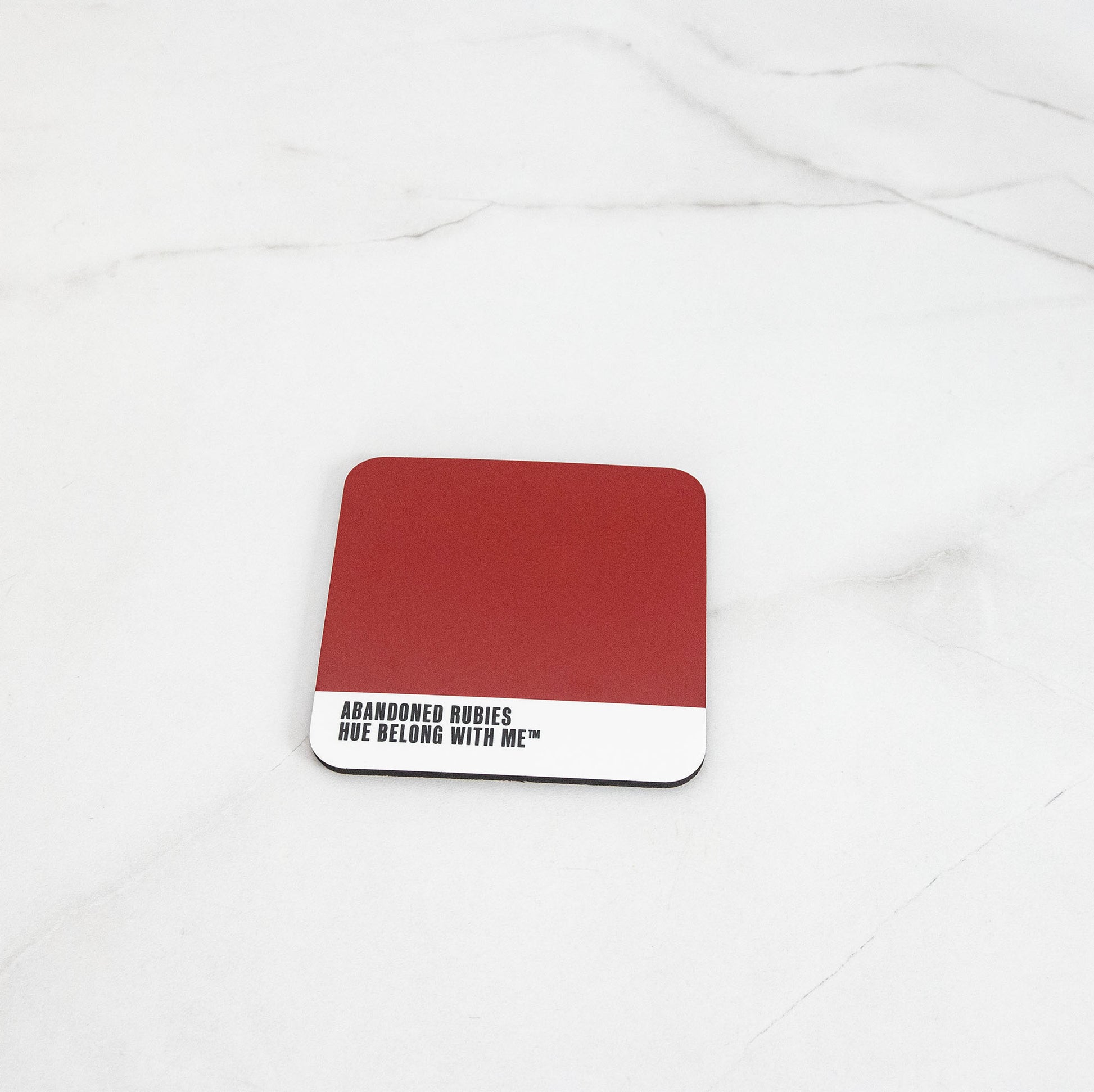 Deep scarlet cork-back coaster, flat lay mockup — Abandoned Rubies by Hue Belong With Me
