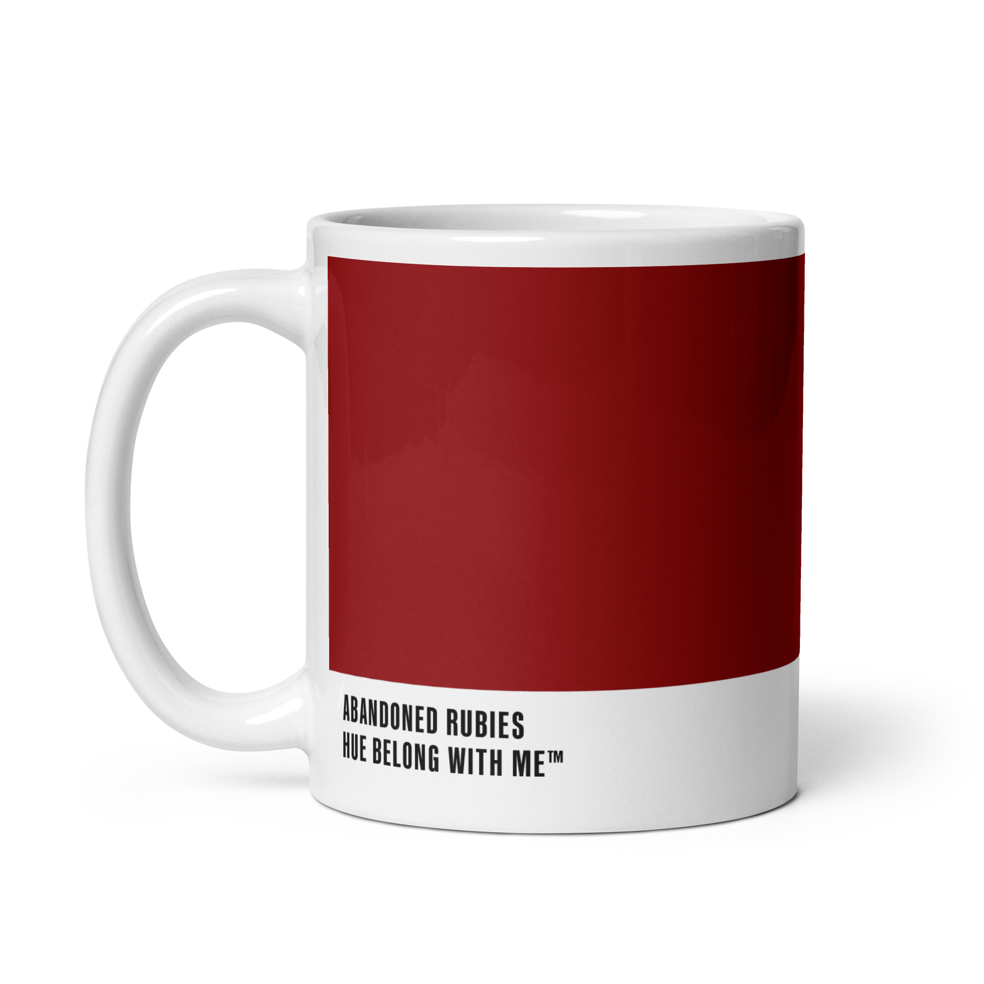 Deep scarlet ceramic mug, handle left, showing Abandoned Rubies label — Abandoned Rubies by Hue Belong With Me