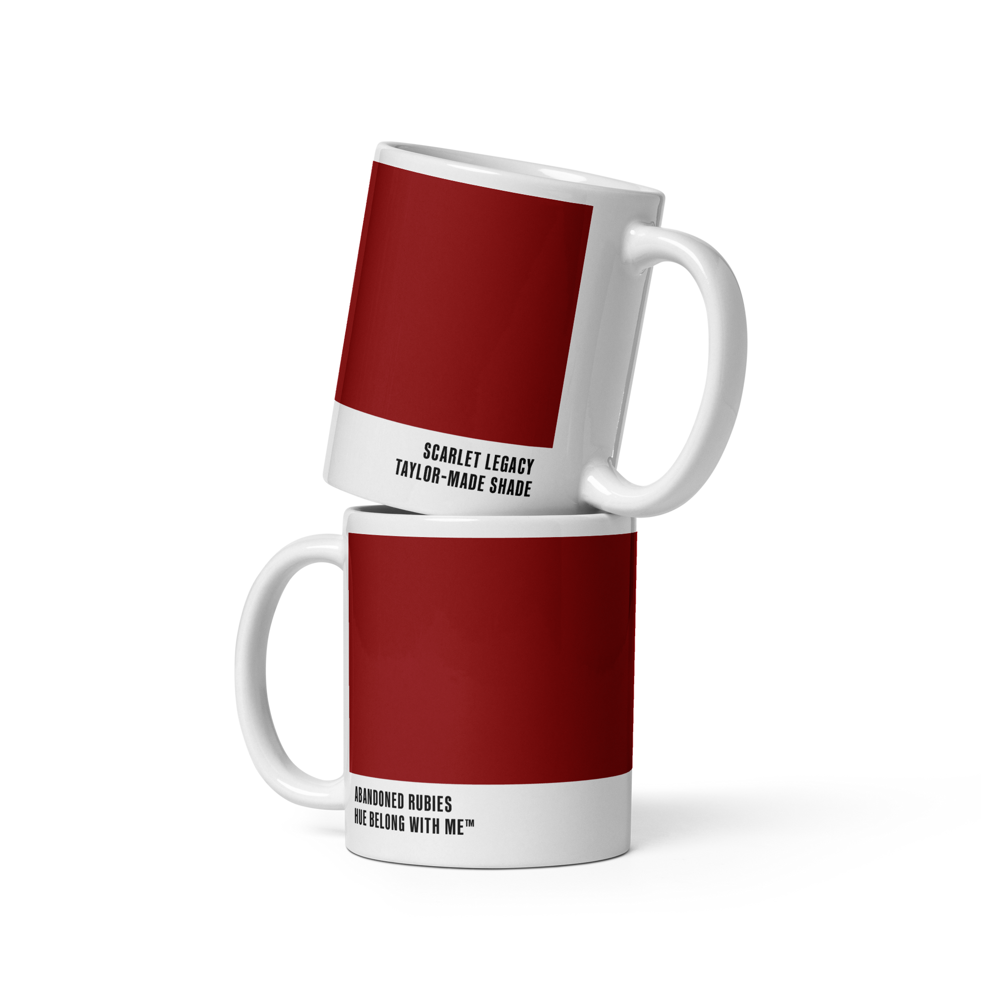 Deep scarlet ceramic mug in stacked two-mug mockup showing both labels — Abandoned Rubies by Hue Belong With Me