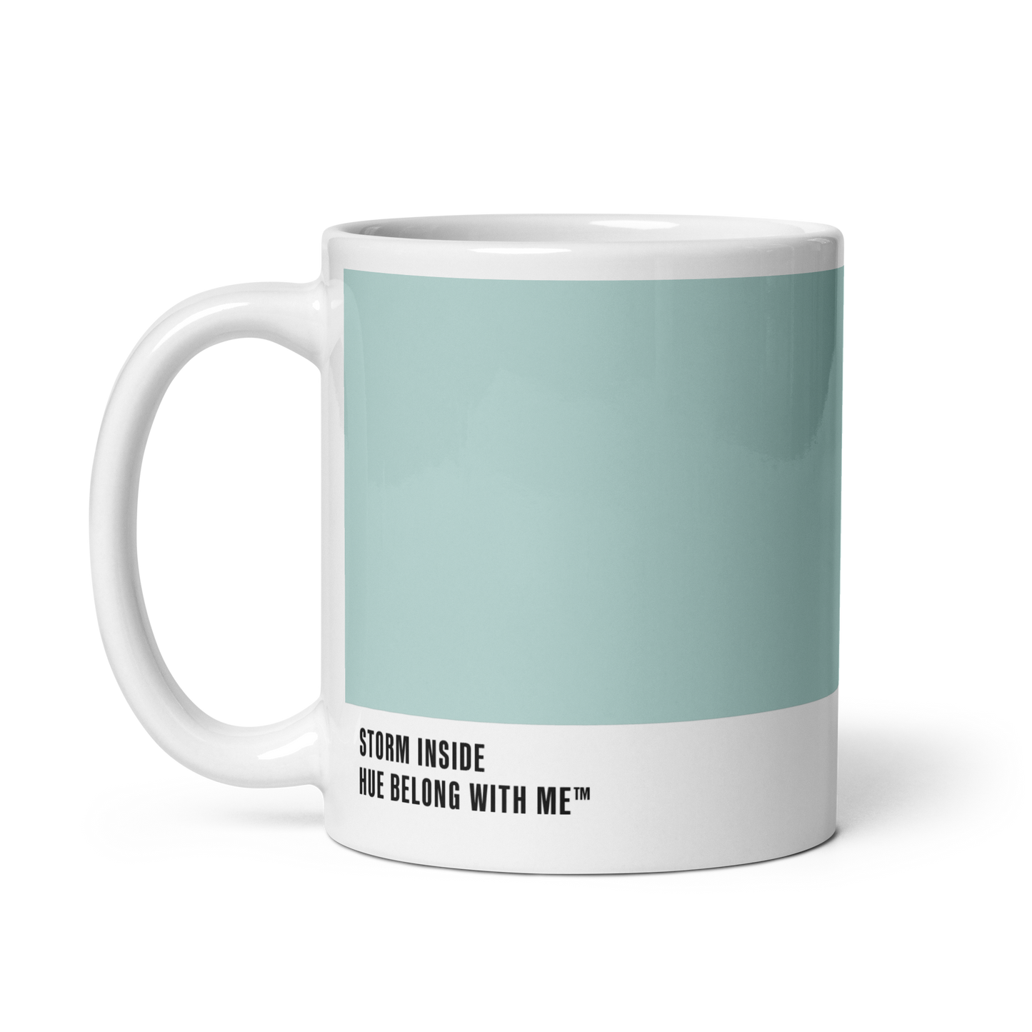 Soft sky-blue ceramic mug, handle left, showing Storm Inside label — Opalite Sky by Hue Belong With Me