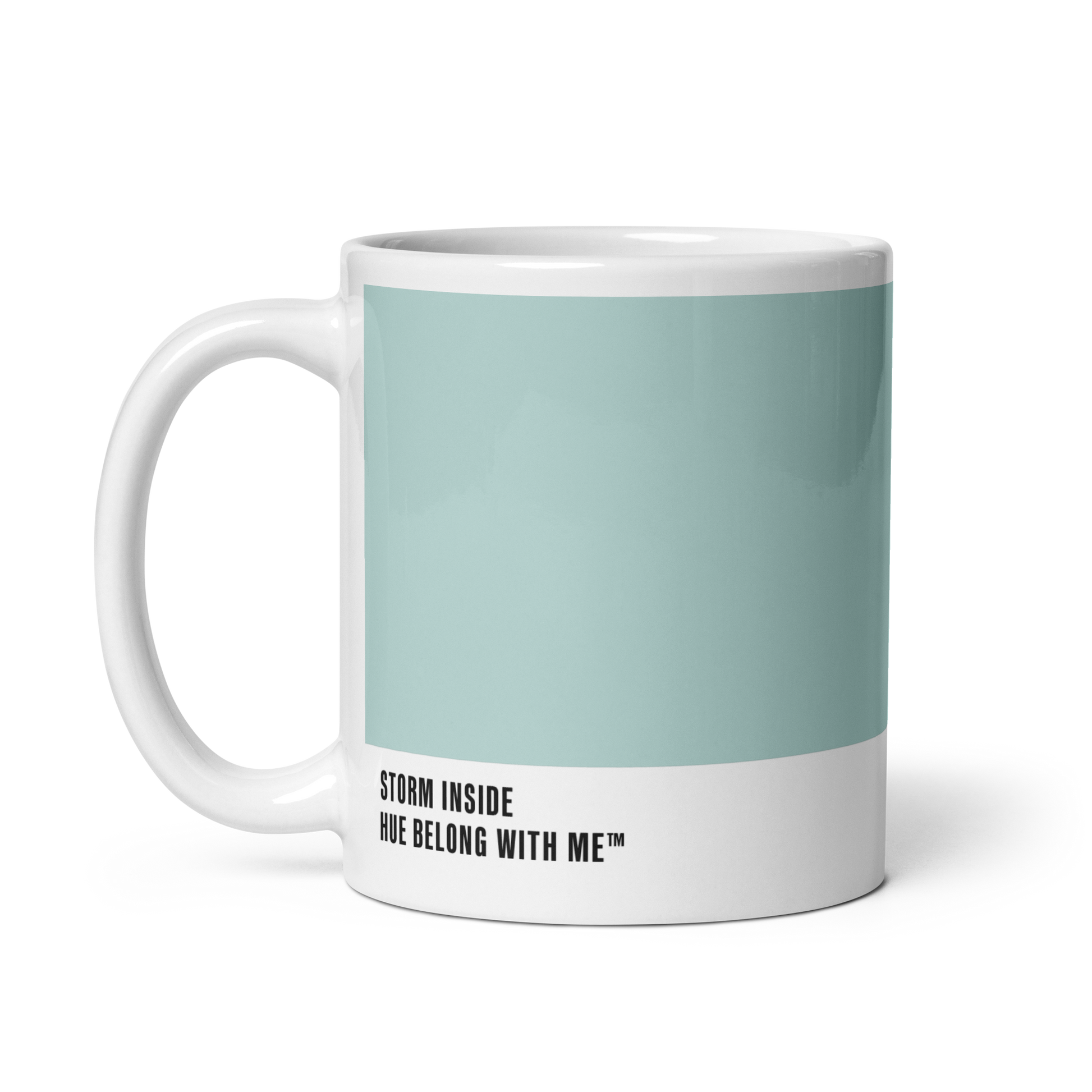 Soft sky-blue ceramic mug, handle left, showing Storm Inside label — Opalite Sky by Hue Belong With Me