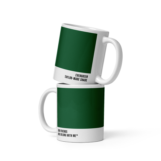 Deep botanical evergreen ceramic mug in stacked two-mug mockup showing both labels — Our Friends by Hue Belong With Me