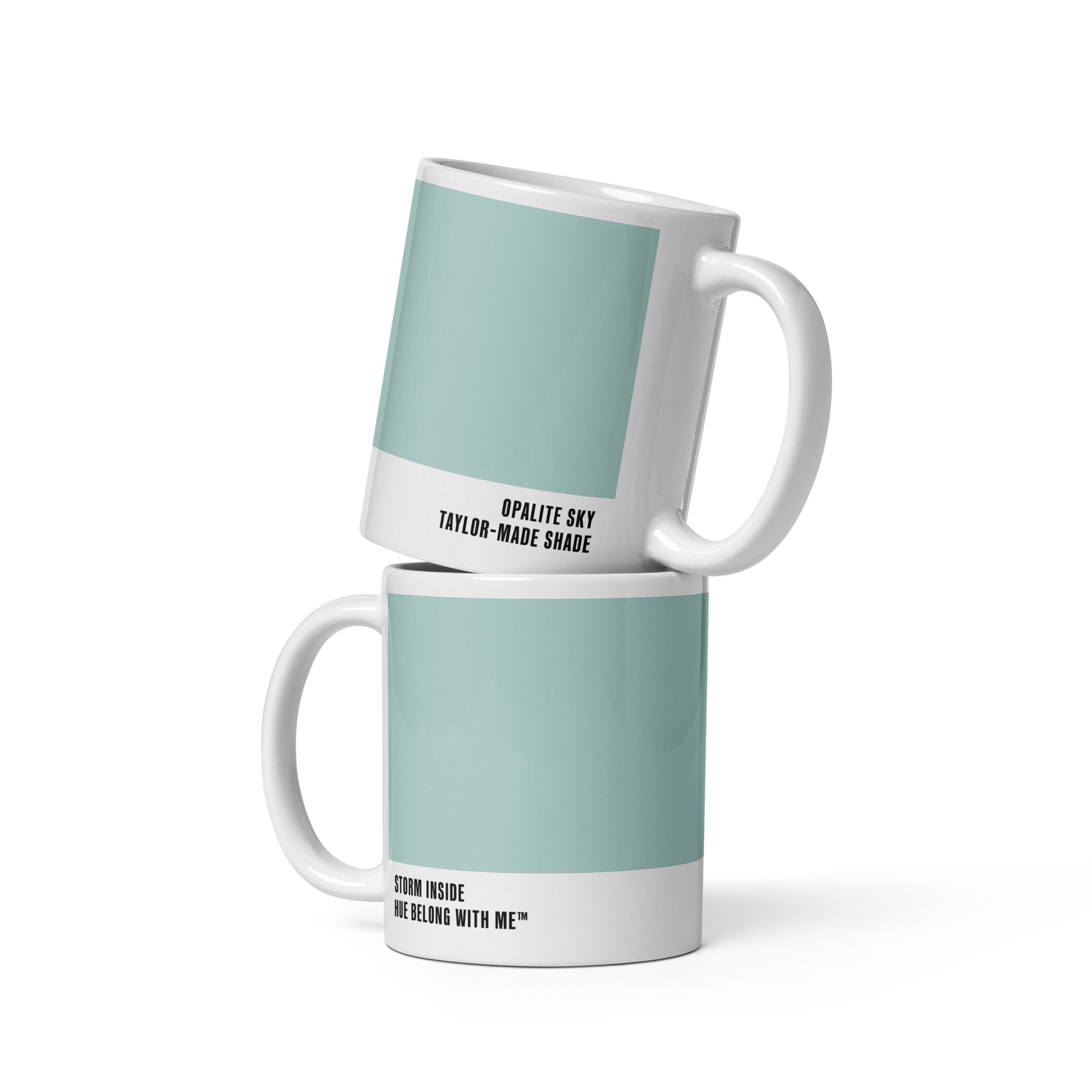 Soft sky-blue ceramic mug in stacked two-mug mockup showing both labels — Opalite Sky by Hue Belong With Me